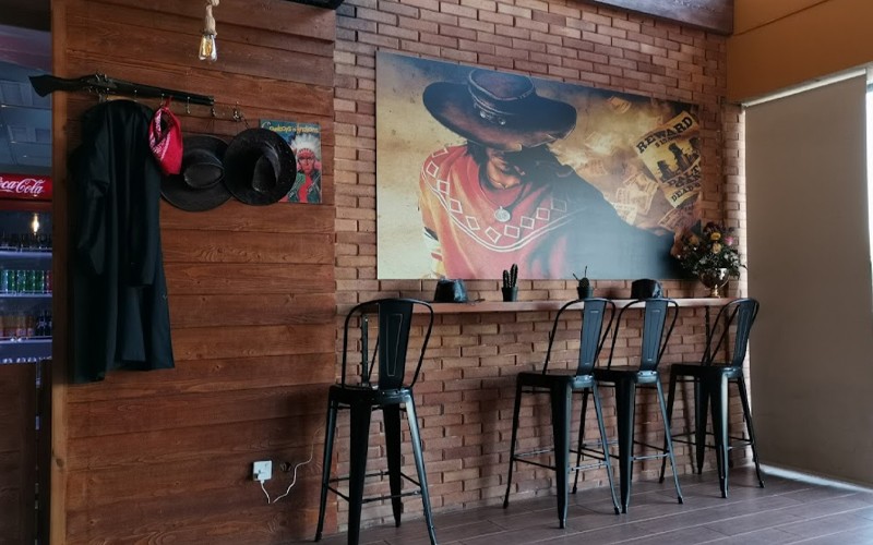 Buy any kind of burger care and get onion rings or mozzarella sticks for free